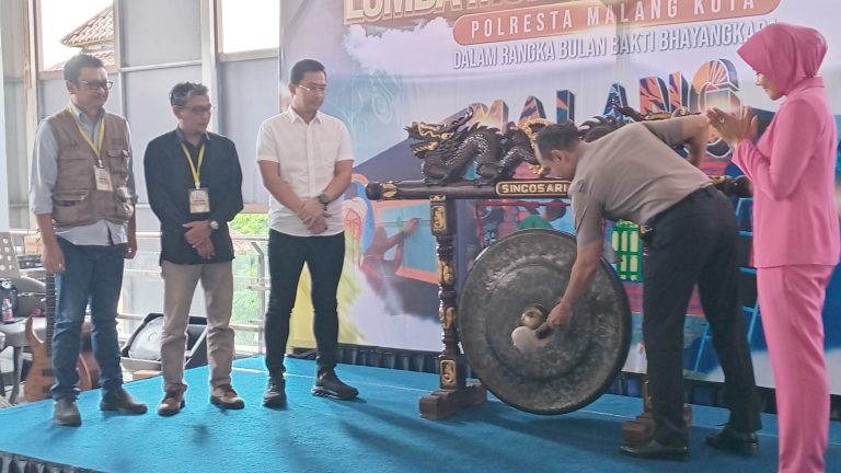 Dekati Warga Lewat Seni, Polresta Malang Kota Gandeng Ratusan Muralis di MCC
